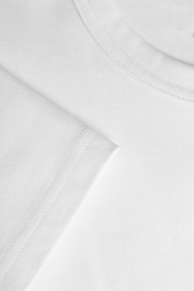 Zoom bild av The interlock tee